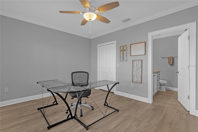 office featuring ornamental molding, light wood-type flooring, and ceiling fan