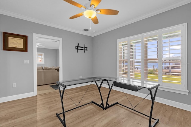 office area featuring ceiling fan, ornamental molding, and hardwood / wood-style floors