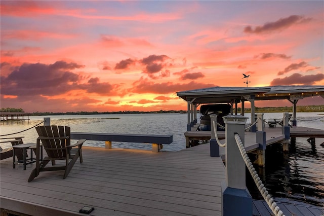 view of dock with a water view