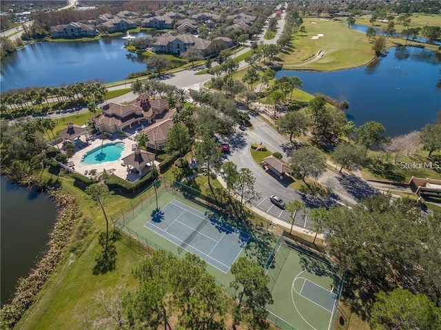 drone / aerial view with a water view