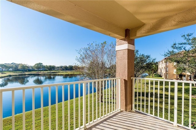 balcony featuring a water view