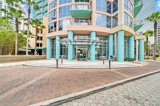 entrance to property with a balcony