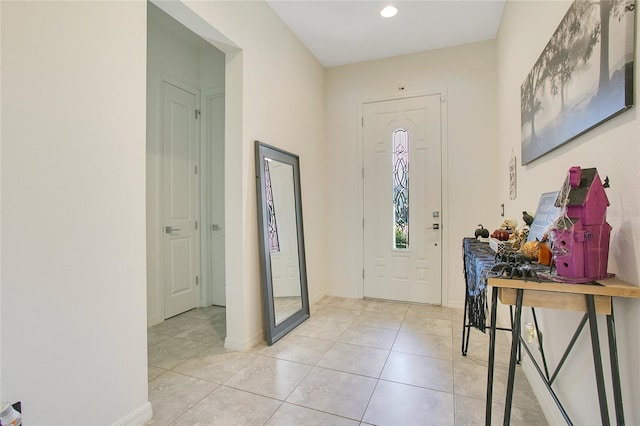 view of tiled foyer entrance