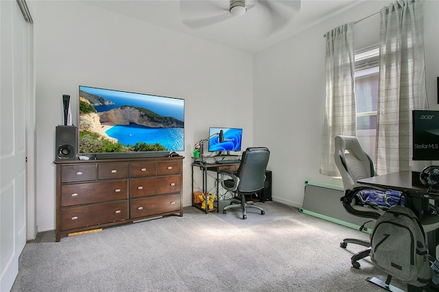 carpeted office with ceiling fan