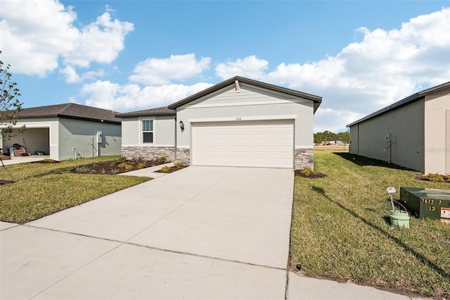 ranch-style house featuring a garage and a front yard