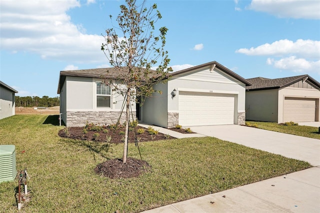 ranch-style home featuring a front yard and a garage