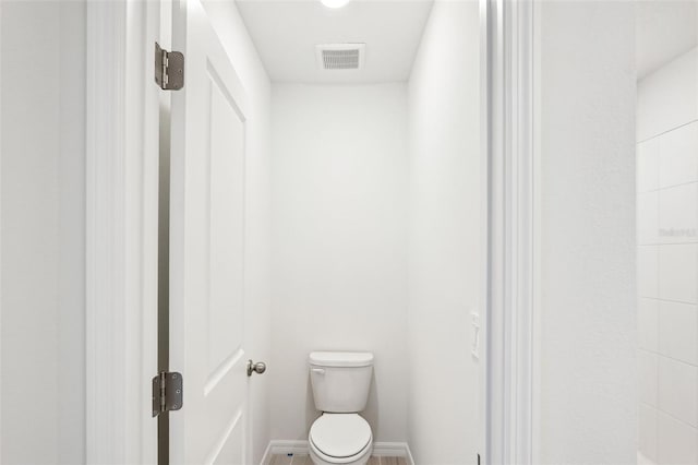 bathroom featuring toilet