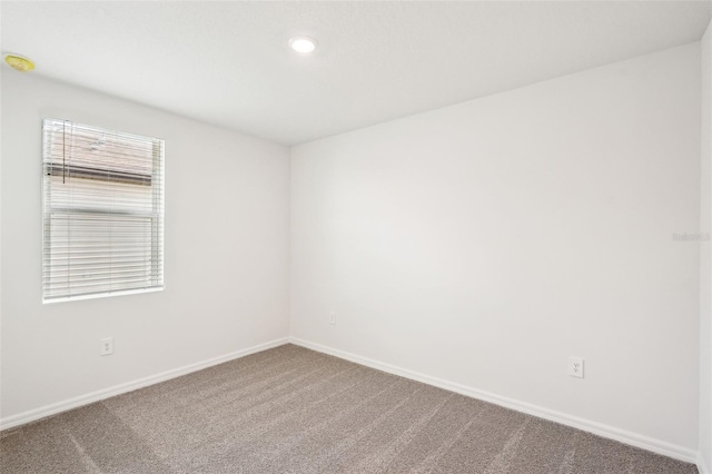 view of carpeted spare room