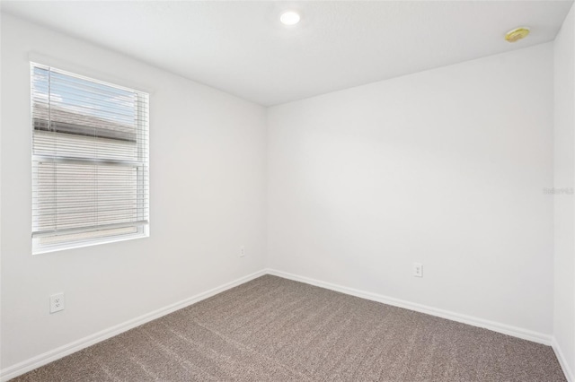 spare room with carpet flooring