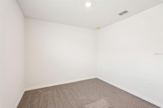 spare room with carpet flooring