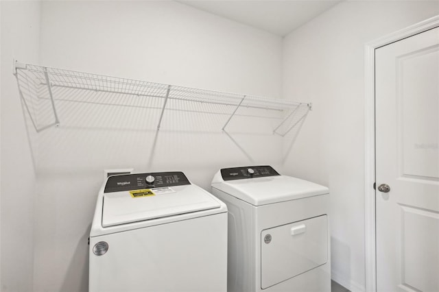 laundry area with washer and clothes dryer