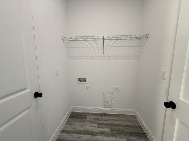 laundry room featuring hookup for an electric dryer, dark wood-type flooring, and hookup for a washing machine