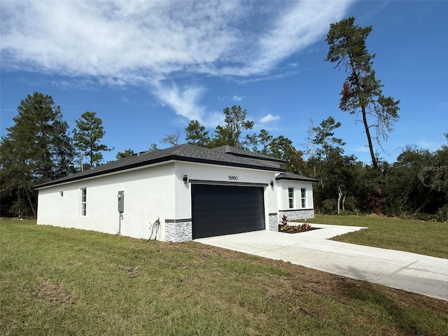 view of property exterior featuring a lawn and a garage