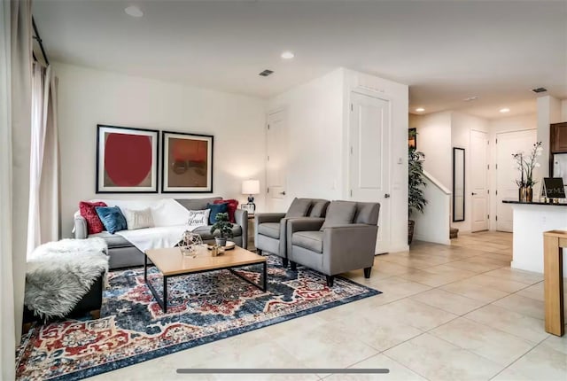 living room featuring light tile patterned floors