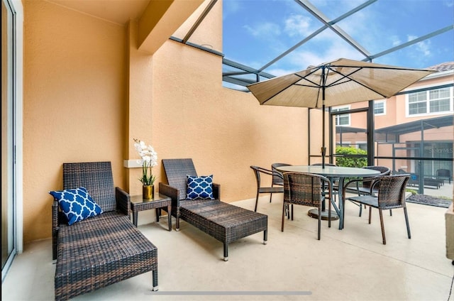 view of patio / terrace with glass enclosure