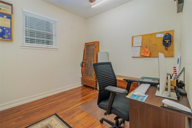 home office featuring wood-type flooring