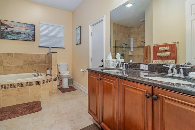 full bathroom with tile patterned flooring, vanity, separate shower and tub, and toilet