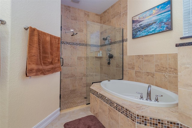 bathroom with tile patterned flooring and plus walk in shower