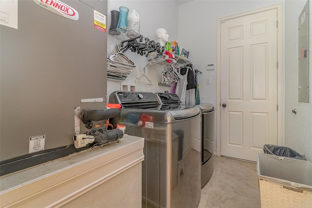 laundry room with separate washer and dryer