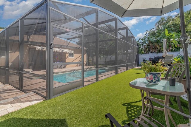 view of pool featuring a patio and a lanai