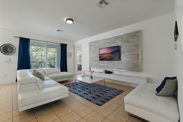 living room featuring light tile patterned flooring