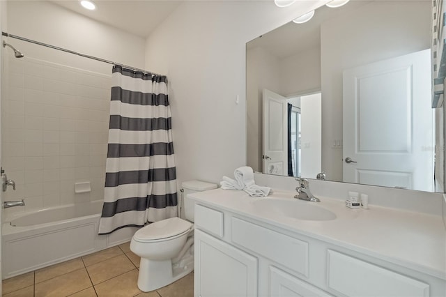 full bathroom with toilet, vanity, shower / bath combination with curtain, and tile patterned flooring