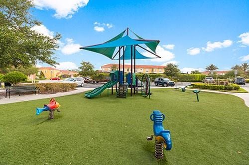 view of playground featuring a lawn