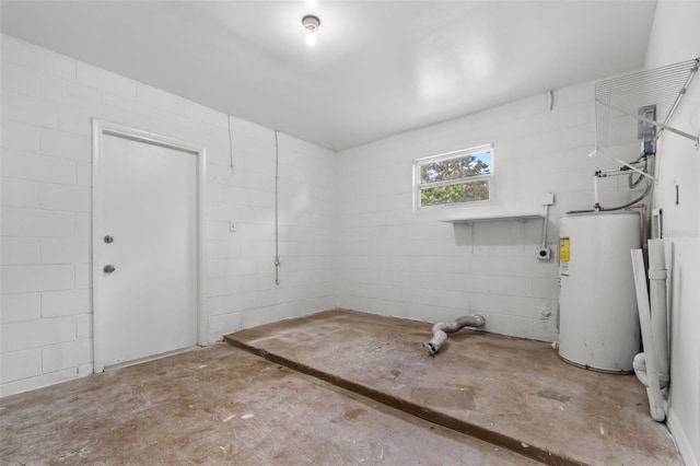 laundry area featuring water heater