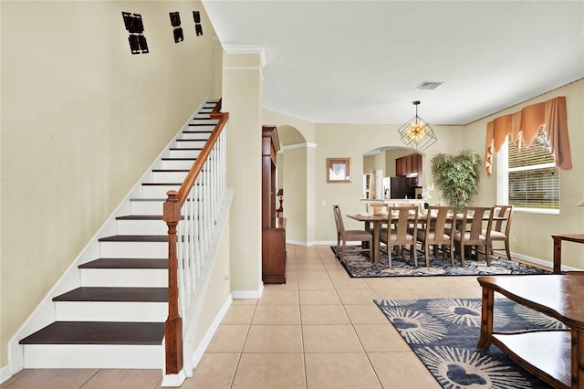 dining room featuring light tile patterned flooring