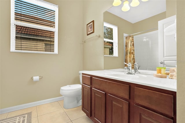 bathroom with vanity, toilet, tile patterned floors, and curtained shower