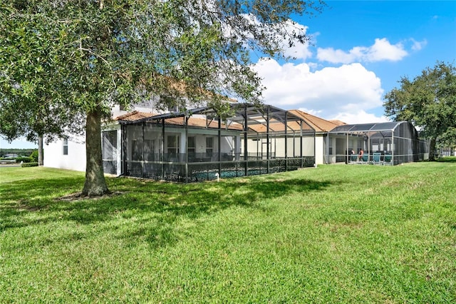 view of yard with a lanai