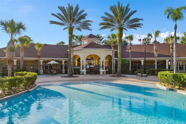 view of swimming pool featuring a patio area