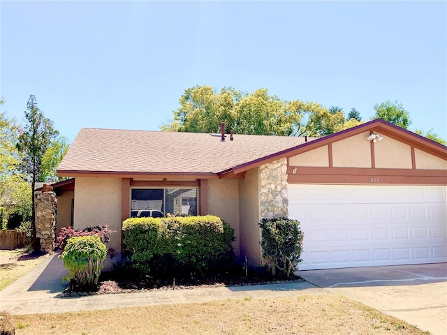 ranch-style home featuring a garage