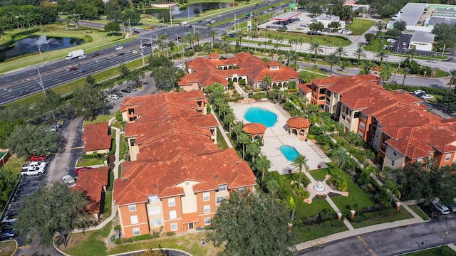 birds eye view of property featuring a water view