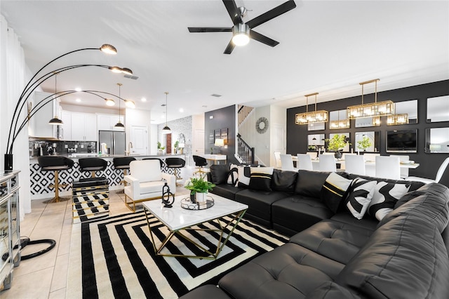 tiled living room featuring ceiling fan