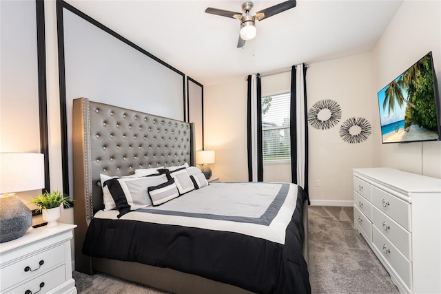 bedroom with light colored carpet and ceiling fan