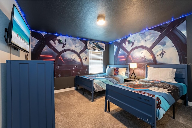 carpeted bedroom featuring a textured ceiling