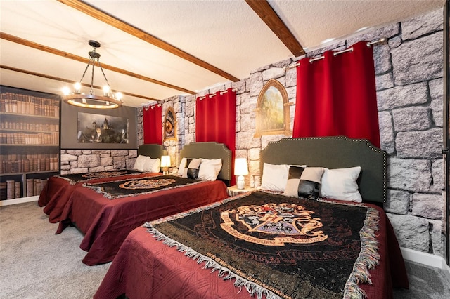 bedroom featuring beam ceiling, a textured ceiling, a notable chandelier, and carpet floors