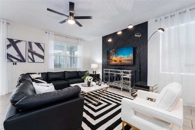 tiled living room featuring ceiling fan