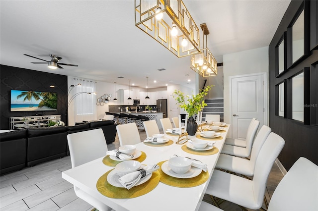 dining room with ceiling fan