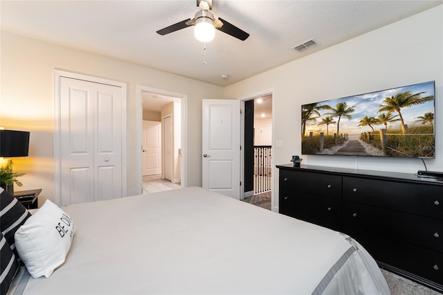 bedroom featuring a closet and ceiling fan