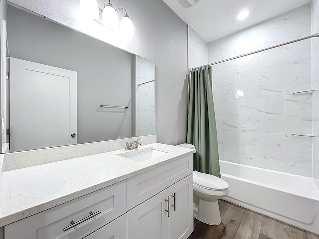 full bathroom with shower / bath combination with curtain, vanity, toilet, and hardwood / wood-style floors