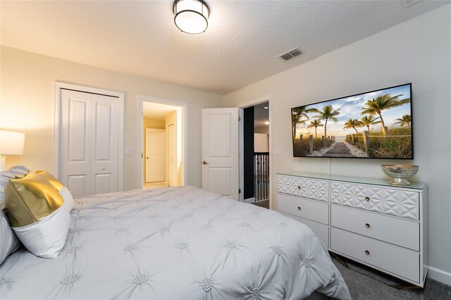8896 Cabot Cliffs Dr, Davenport, FL 33896 - bedroom with a closet, carpet, and baseboards