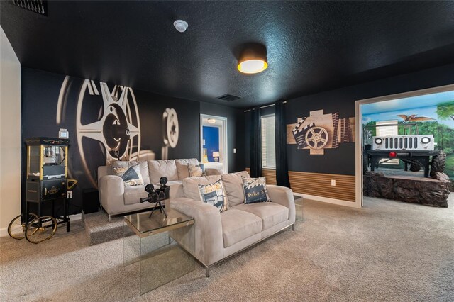 8896 Cabot Cliffs Dr, Davenport, FL 33896 - carpeted home theater room with baseboards and a textured ceiling