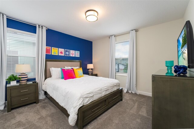 8896 Cabot Cliffs Dr, Davenport, FL 33896 - carpeted bedroom with baseboards