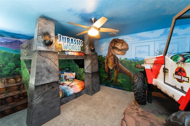 8896 Cabot Cliffs Dr, Davenport, FL 33896 - bedroom with carpet floors, a fireplace, and a textured ceiling