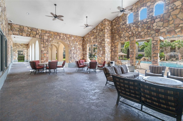 view of patio / terrace featuring outdoor lounge area and ceiling fan