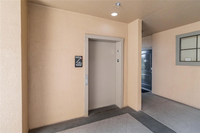 doorway to property with elevator