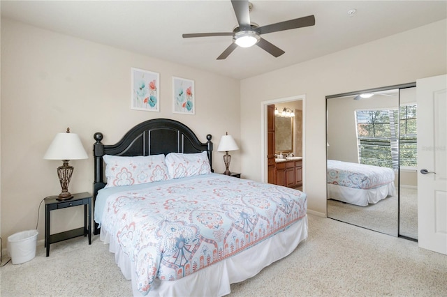 bedroom featuring ensuite bathroom, a closet, and ceiling fan