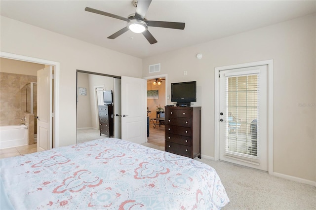 carpeted bedroom featuring ensuite bath, access to outside, and ceiling fan